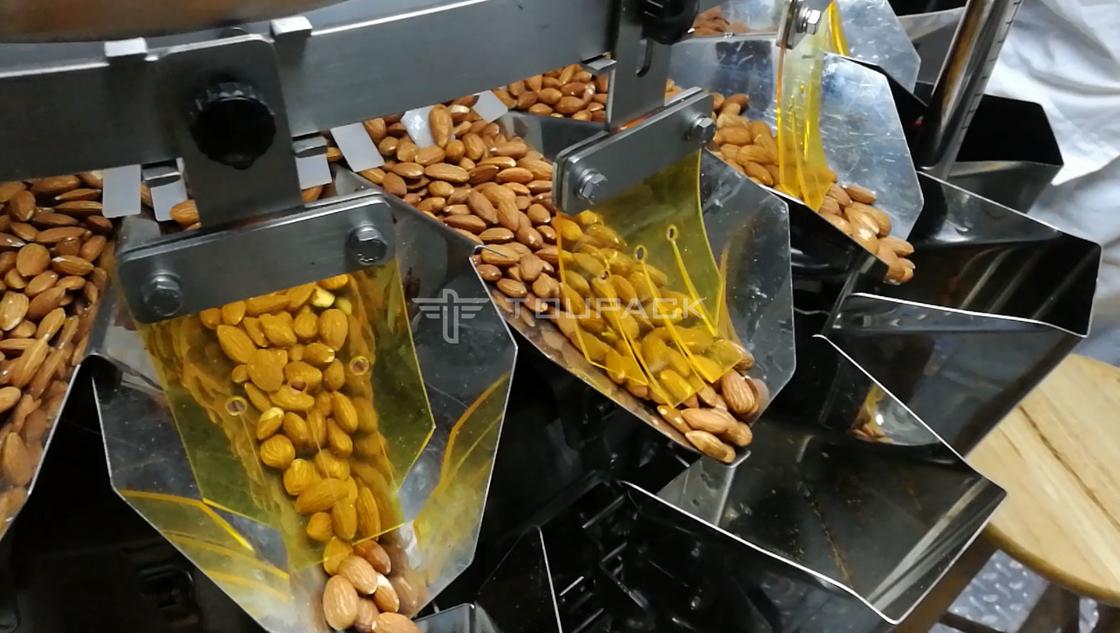 Z Elevator Conveyor Full Automatic Weighing Packing Machine For Season Bean Raisin Peanut Snacks Rice