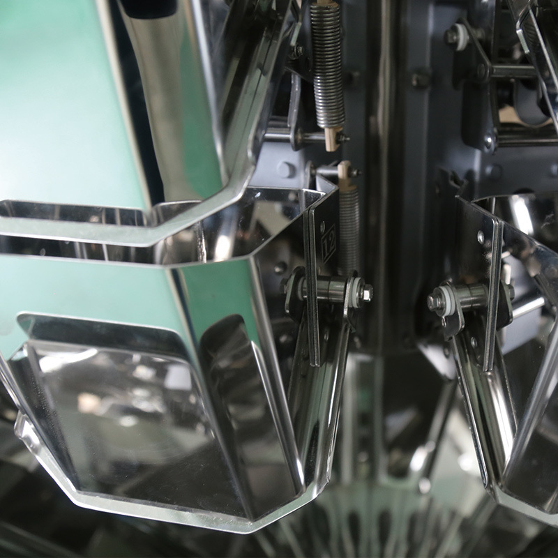 Fully Automatic High Speed Nitrogen Vertical Form Fill Seal Pouch Snack Food Weighing Puffs Food Pellet Packing Machine